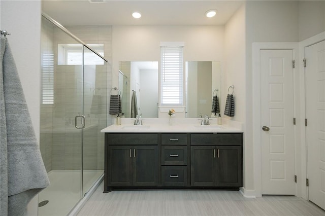 2778 Messenger Way, Bryan, TX 77803 - full bathroom featuring healthy amount of natural light, double vanity, a shower stall, and recessed lighting