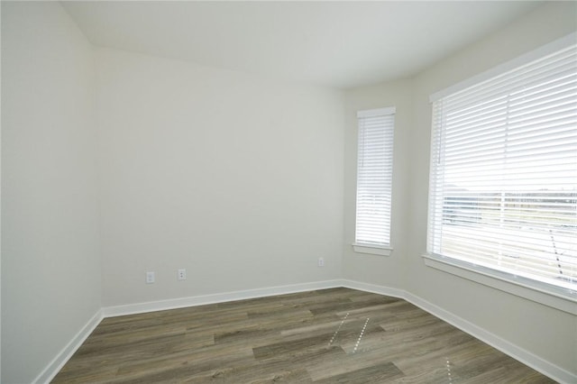 2778 Messenger Way, Bryan, TX 77803 - unfurnished room featuring dark wood-style flooring and baseboards