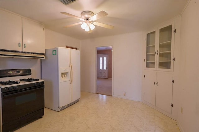 kitchen with white cabinetry, white refrigerator with ice dispenser, range with gas stovetop, and ceiling fan