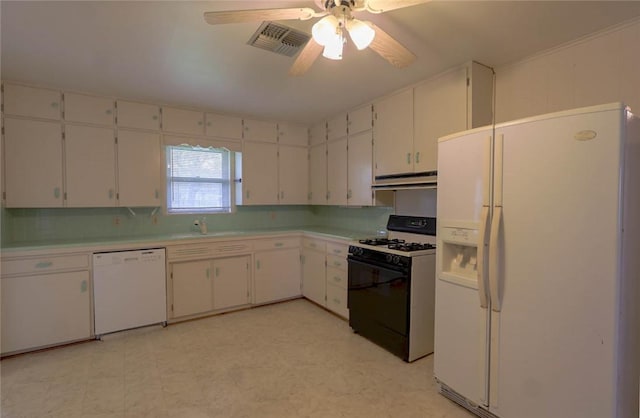 kitchen with white cabinetry, sink, white appliances, and decorative backsplash