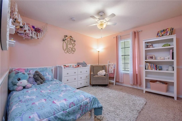 bedroom with light colored carpet and ceiling fan