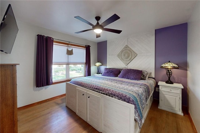 bedroom featuring ceiling fan and light wood-type flooring