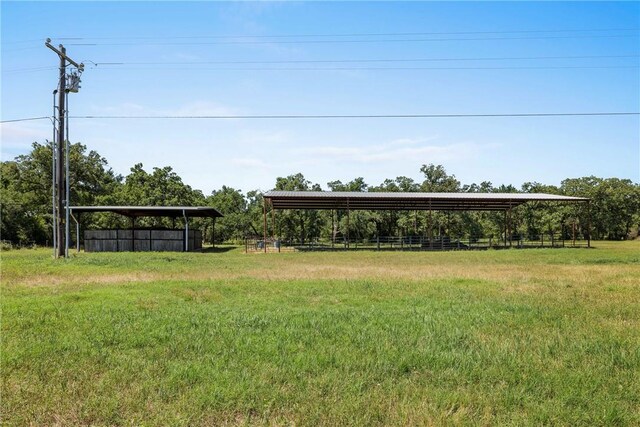 9560 County Road 121, Iola, TX 77861 - surrounding community with a carport