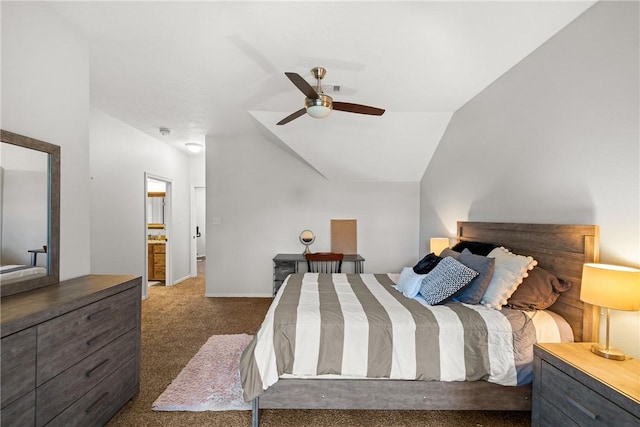 9560 County Road 121, Iola, TX 77861 - carpeted bedroom featuring vaulted ceiling, ensuite bathroom, baseboards, and a ceiling fan