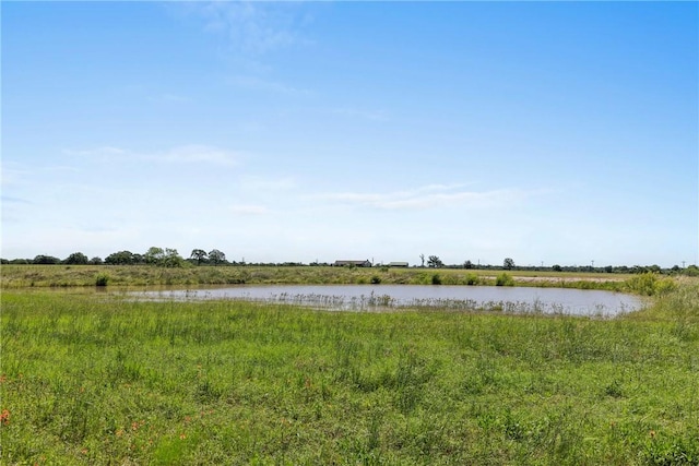 9560 County Road 121, Iola, TX 77861 - water view featuring rural landscape