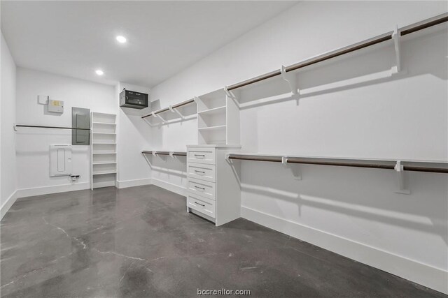 spacious closet with electric panel