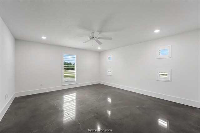 spare room featuring ceiling fan