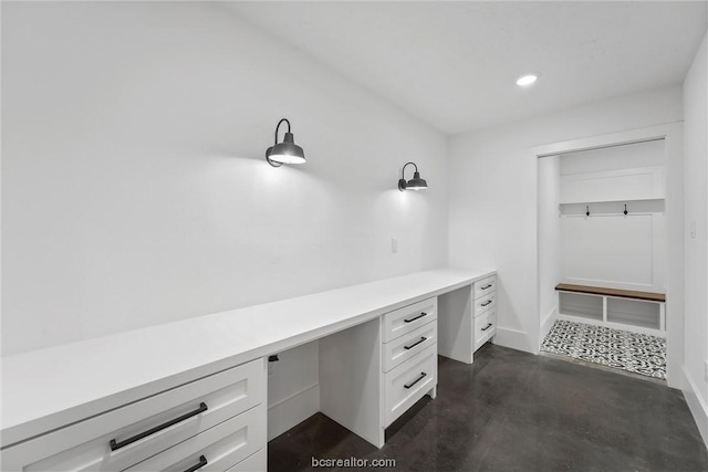 interior space featuring concrete flooring