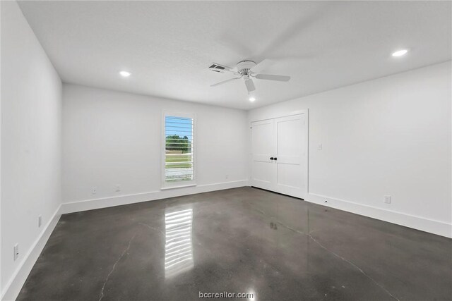 unfurnished room featuring ceiling fan