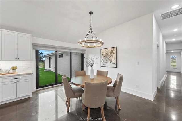 dining room with an inviting chandelier