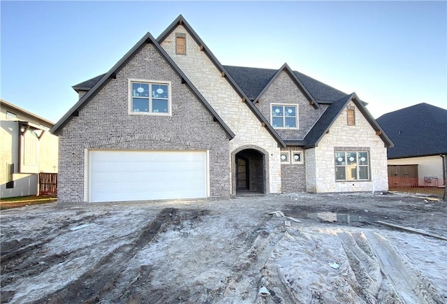 view of front of property featuring a garage