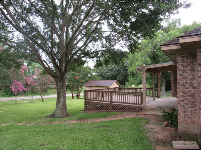 2400 Brookbend Dr, Brenham, TX 77833 - view of grassy yard with a deck