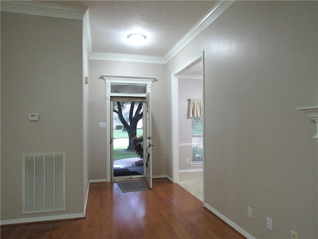 2400 Brookbend Dr, Brenham, TX 77833 - entryway featuring wood finished floors and ornamental molding