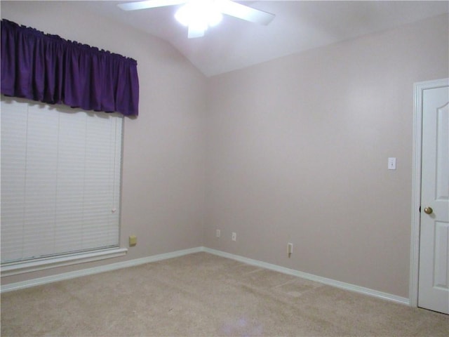 2400 Brookbend Dr, Brenham, TX 77833 - empty room featuring light carpet, ceiling fan, and vaulted ceiling