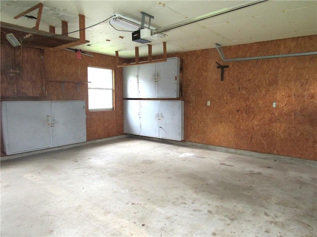 2400 Brookbend Dr, Brenham, TX 77833 - garage featuring a garage door opener