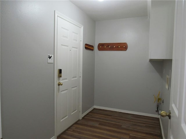 2400 Brookbend Dr, Brenham, TX 77833 - doorway featuring dark wood-type flooring and baseboards