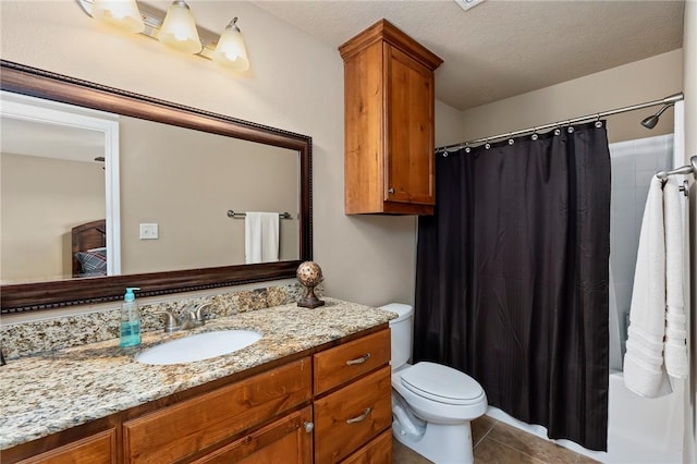 full bathroom with shower / tub combo with curtain, toilet, a textured ceiling, vanity, and tile patterned flooring