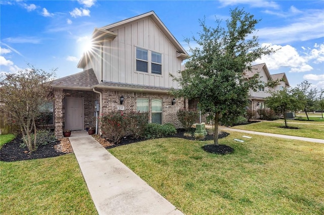 view of front of home with a front lawn