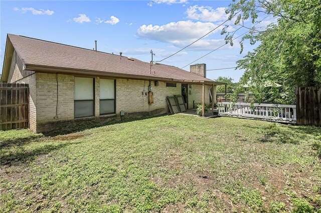 2801 Celinda Cir, College Station, TX 77845 - back of property with brick siding and a chimney