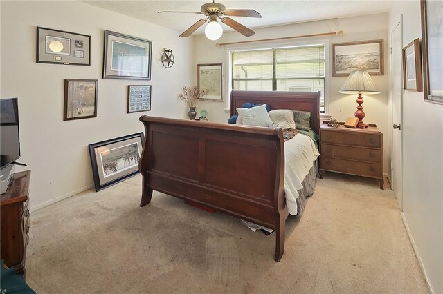 2801 Celinda Cir, College Station, TX 77845 - bedroom featuring light colored carpet, baseboards, and a ceiling fan