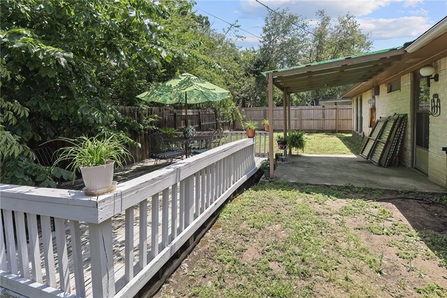 2801 Celinda Cir, College Station, TX 77845 - view of yard with outdoor dining area, a patio area, and a wooden deck