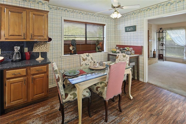 2801 Celinda Cir, College Station, TX 77845 - dining area featuring wallpapered walls, dark wood-style flooring, and a ceiling fan