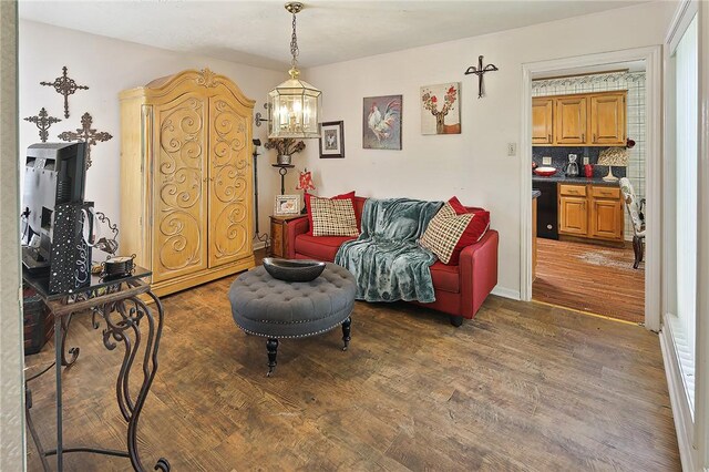 2801 Celinda Cir, College Station, TX 77845 - sitting room featuring wood finished floors and a chandelier