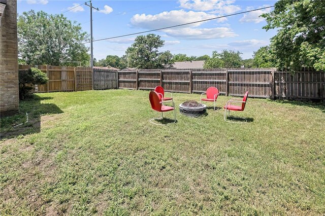 2801 Celinda Cir, College Station, TX 77845 - view of yard with a fire pit