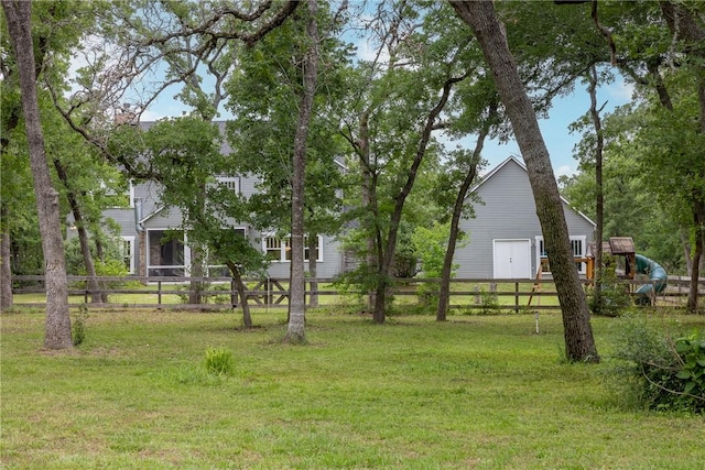 view of yard featuring fence