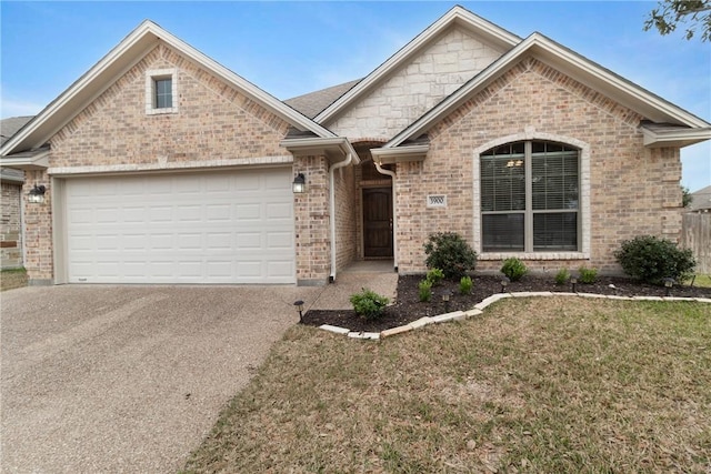 ranch-style house with driveway, a front lawn, an attached garage, and brick siding