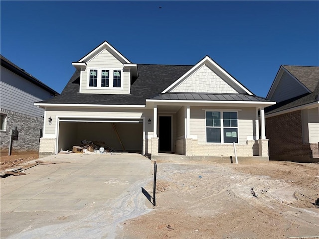 craftsman house with a garage