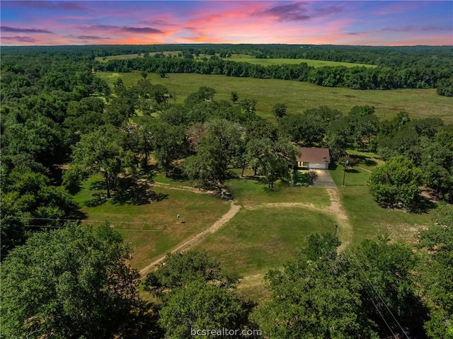 aerial view at dusk with a rural view