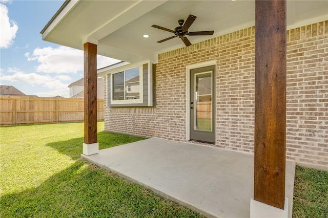 view of patio featuring ceiling fan