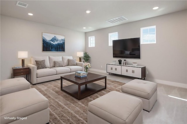 living room with light colored carpet