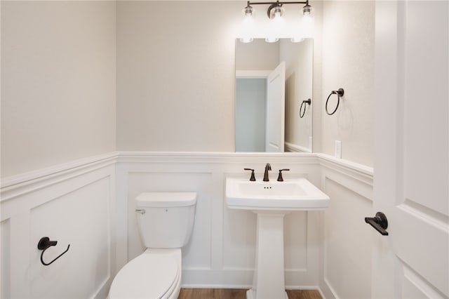 bathroom with toilet and sink