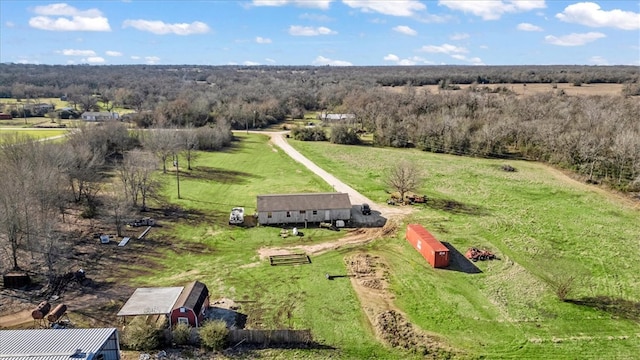 birds eye view of property with a rural view