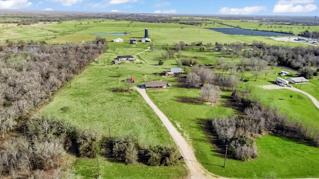 birds eye view of property featuring a rural view