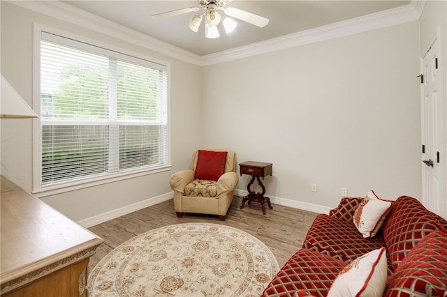 4309 Berwick Pl, College Station, TX 77845 - living area featuring light wood finished floors, ceiling fan, baseboards, and ornamental molding