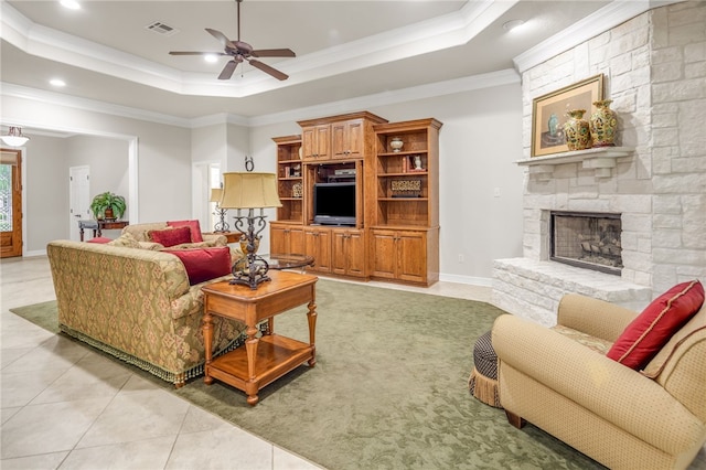 4309 Berwick Pl, College Station, TX 77845 - living area featuring ceiling fan, light tile patterned floors, a raised ceiling, a fireplace, and recessed lighting