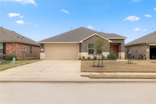 single story home featuring a garage