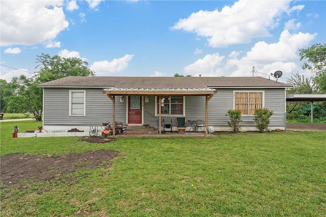 117 S Judge Hailey Dr, Lott, TX 76656 - rear view of property featuring a lawn and entry steps