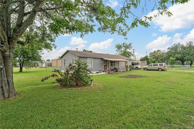 117 S Judge Hailey Dr, Lott, TX 76656 - back of property with a yard