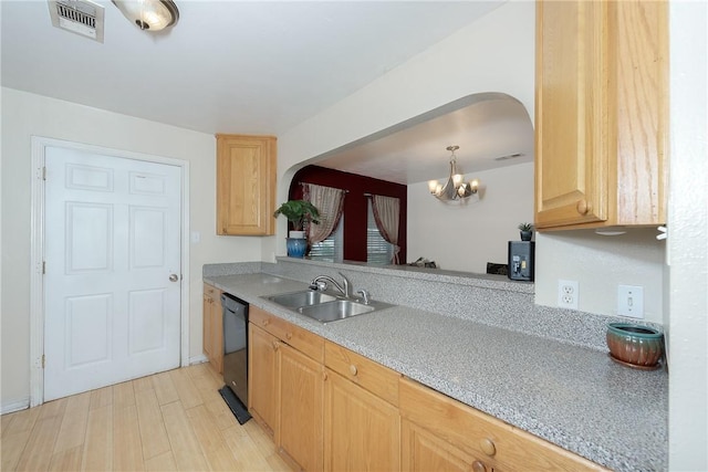 kitchen featuring dishwasher, sink, light wood-type flooring, light brown cabinetry, and a chandelier