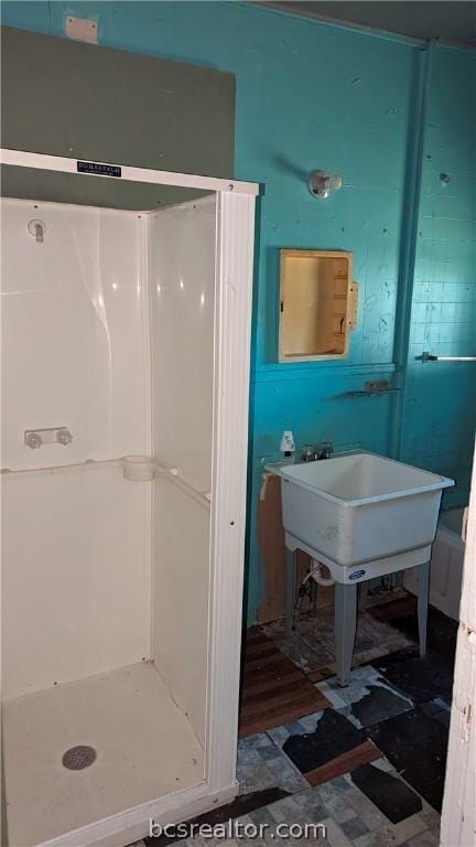 bathroom featuring walk in shower