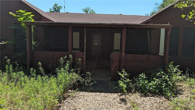 exterior space with a sunroom