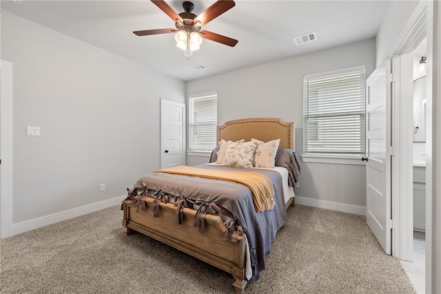 carpeted bedroom with ceiling fan