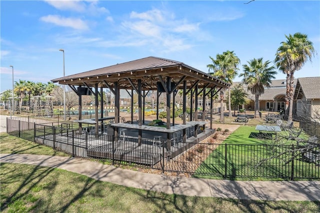 view of community with a gazebo and a yard