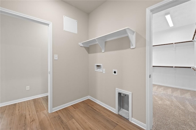 laundry area featuring laundry area, baseboards, washer hookup, and electric dryer hookup