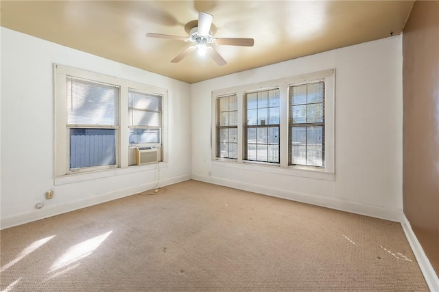 unfurnished room featuring ceiling fan, cooling unit, and light colored carpet