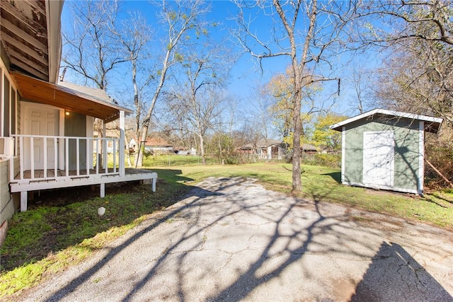 view of patio featuring a shed